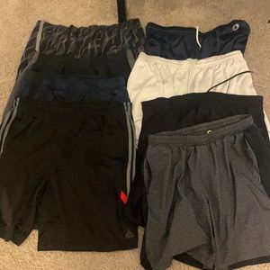 Bundle of men’s athletic shorts. 8 shorts, Mostly LG, one M